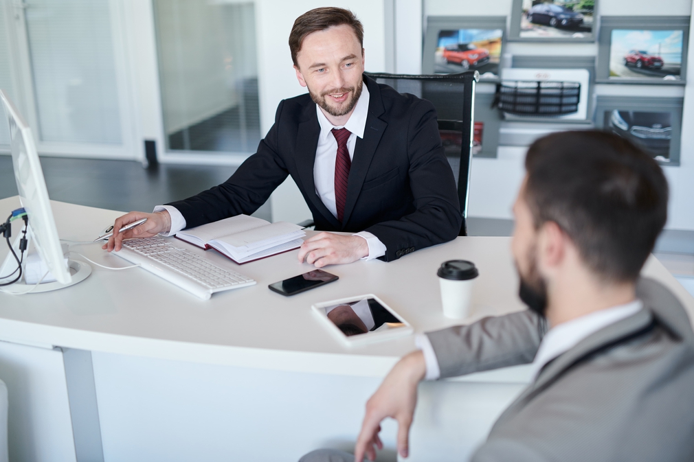 Business manager with client