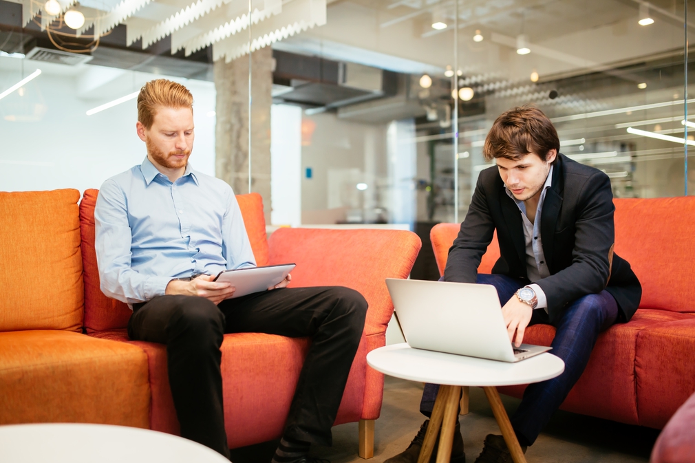 Business colleagues in casual meeting room