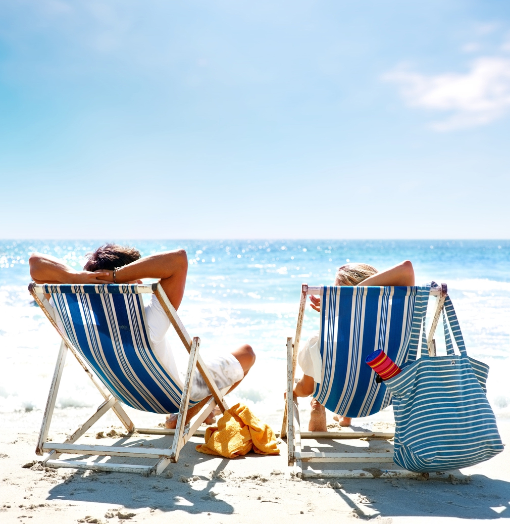 Couples in beach chairs