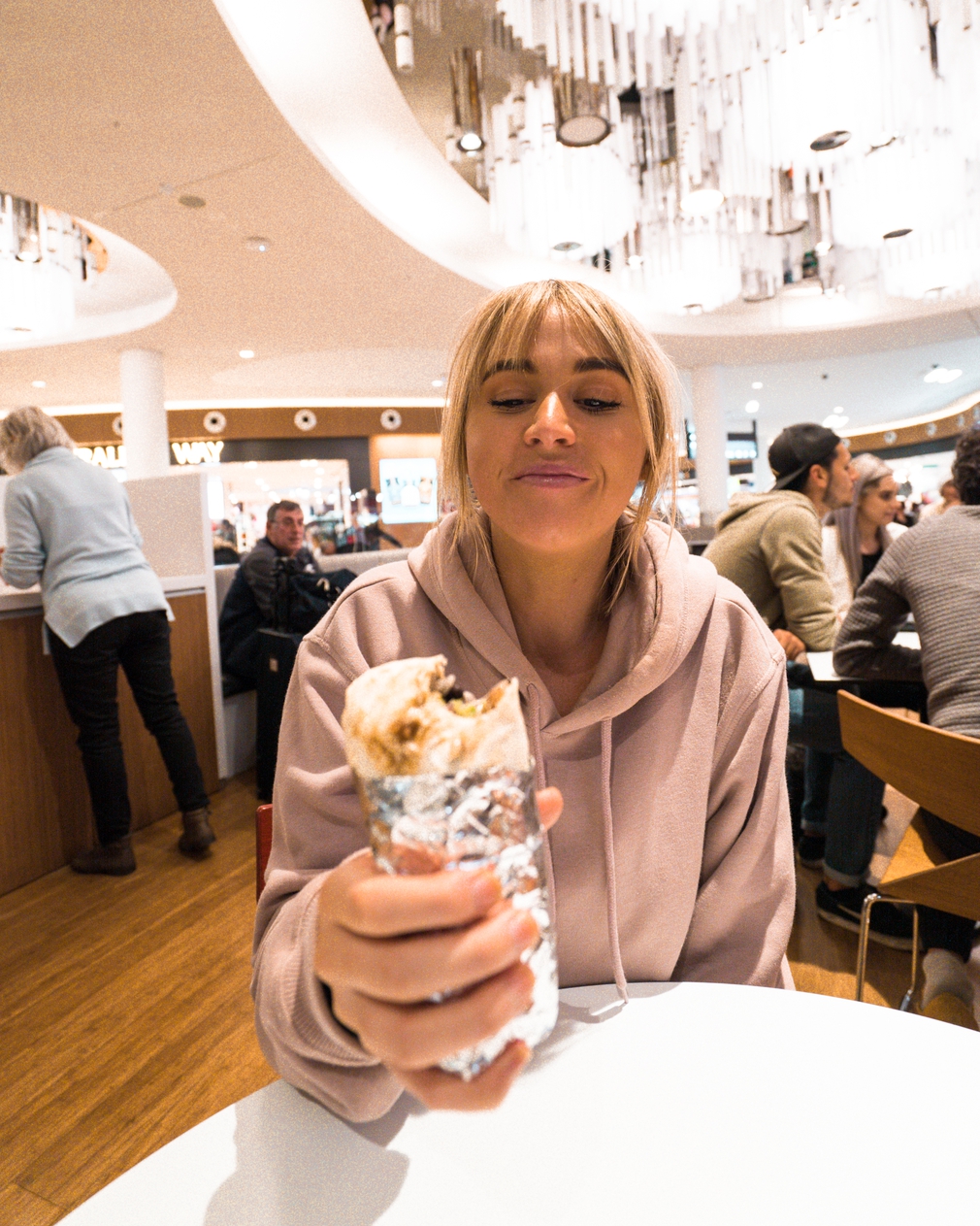 Jess eating a burrito